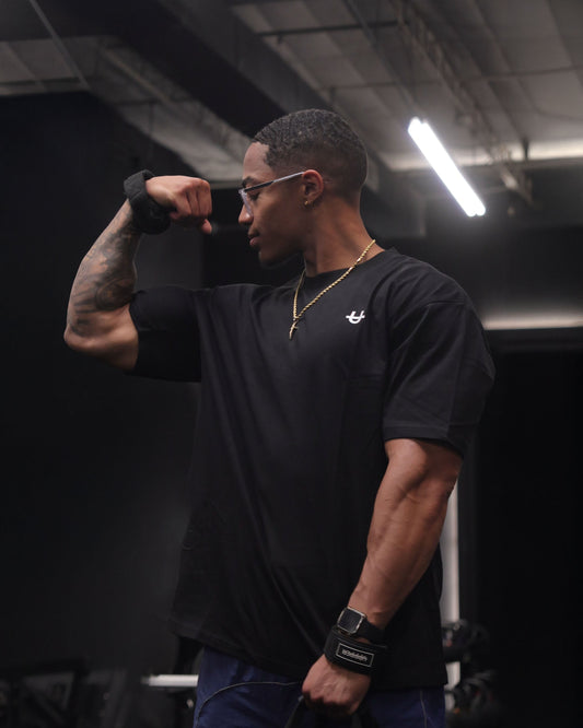 man flexing wearing uppper