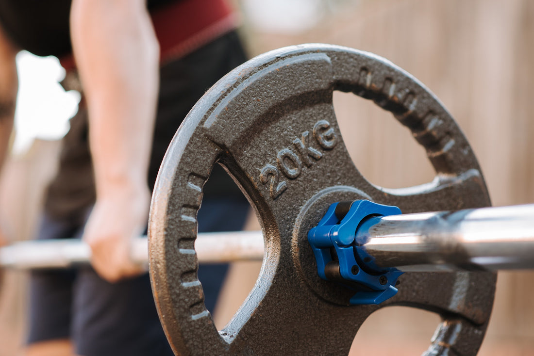 man lifting weights